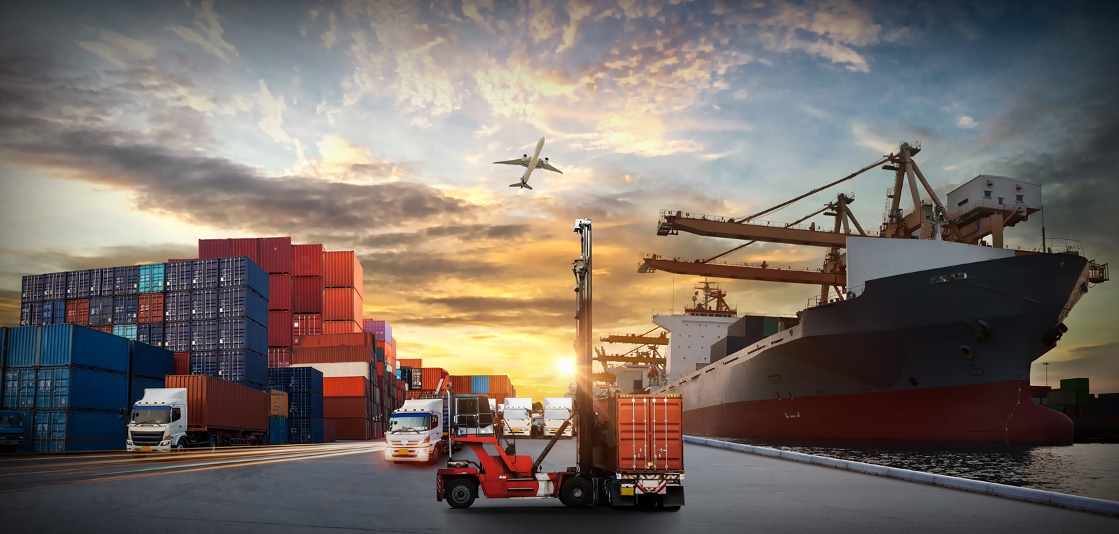 Logistics and transportation of Container Cargo ship and Cargo plane with working crane bridge in shipyard at sunrise, logistic import export and transport industry background